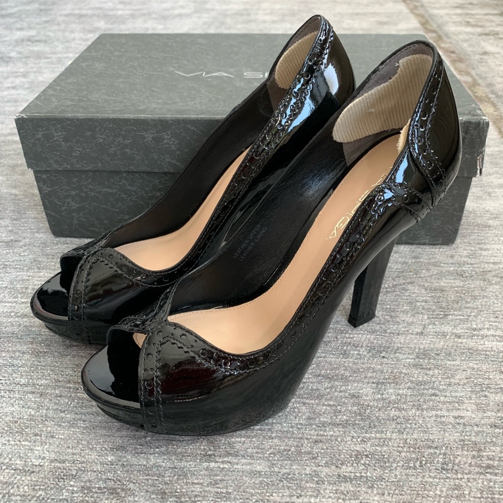 Black patent leather peep toe pumps